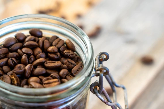 Coffee beans in airtight container for freshness preservation