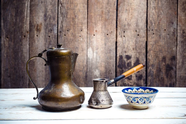 Historical coffee preparation tools including ibrik, cezve and early coffee pots